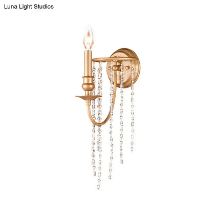 Modern style gold sconce with clear crystal beaded strand bedroom light