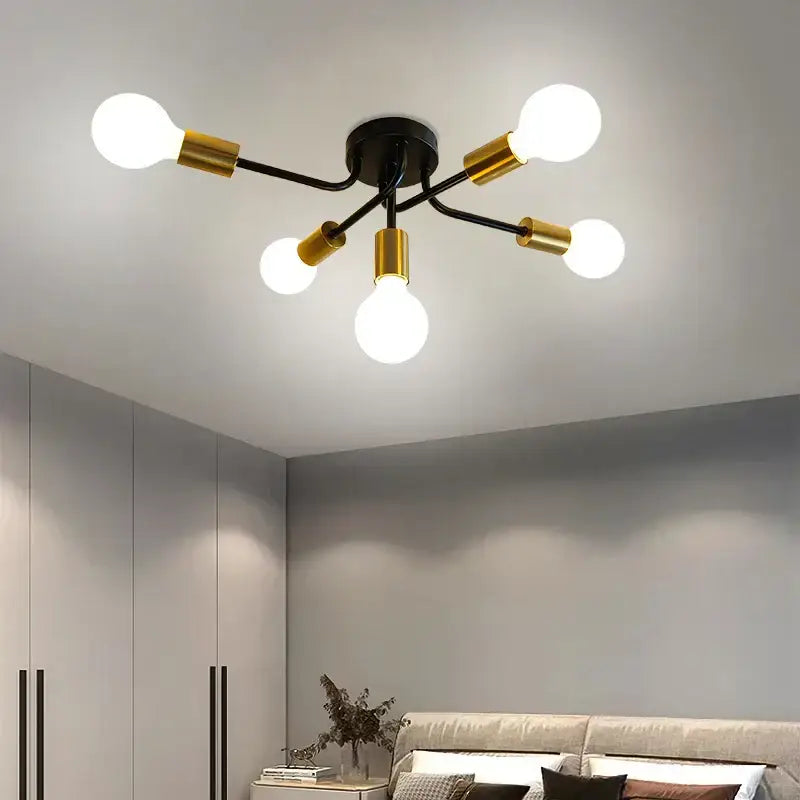 Modern symmetrical brass ceiling light with five spheres for living room