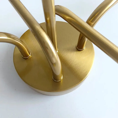 Modern symmetrical brass ceiling light with five spheres for living room