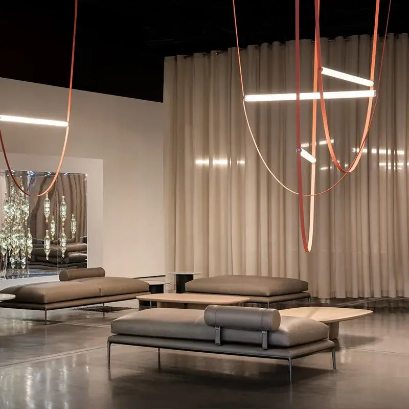 Modern tan leather and brass led tube suspension chandelier living room
