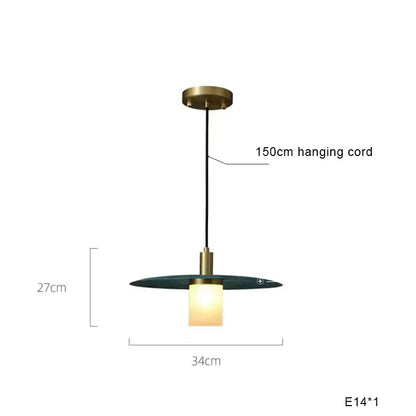 Modern teal glass and brass pendant light for kitchen island