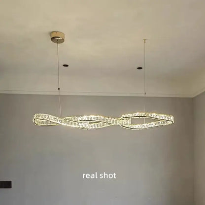 Modern twisted gold metal crystal pendant light for dining room