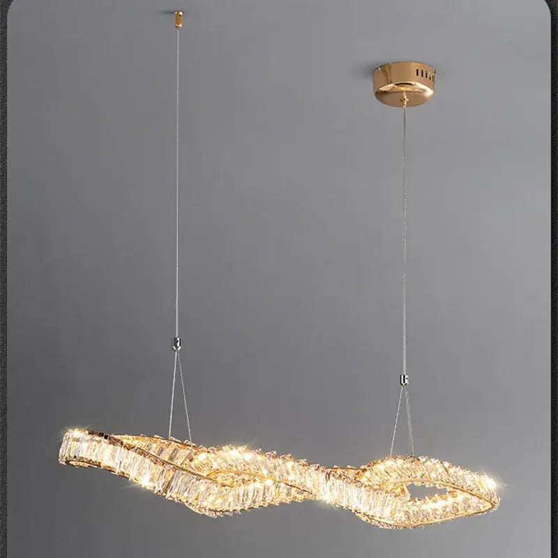 Modern twisted gold metal crystal pendant light for dining room