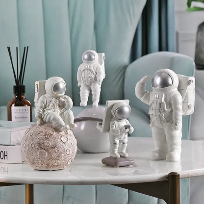 Modern white and gold astronaut phone holder living room figurine