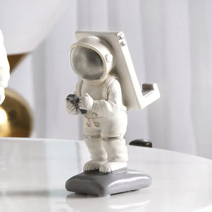 Modern white and gold astronaut phone holder living room figurine