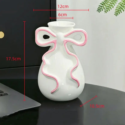 Modern white ceramic vase with pink cute bow living room decor