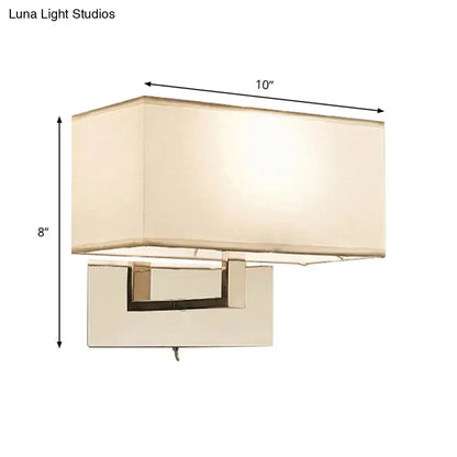 Modern white fabric wall sconce with polished brass for bedroom