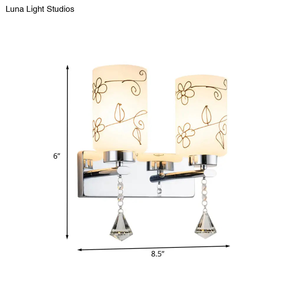 DecorBites™ Modern White Glass Cylinder Wall Sconce with 2 Bulbs, Chrome Finish and Elegant Flower Pattern