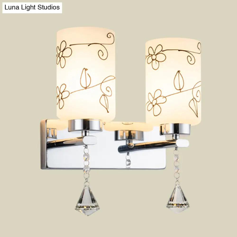 DecorBites™ Modern White Glass Cylinder Wall Sconce with 2 Bulbs, Chrome Finish and Elegant Flower Pattern