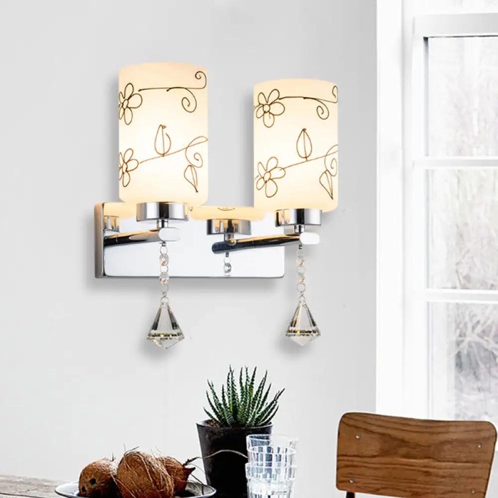 DecorBites™ Modern White Glass Cylinder Wall Sconce with 2 Bulbs, Chrome Finish and Elegant Flower Pattern