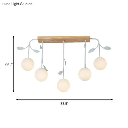 Modern white glass orb island light with wood canopy kitchen pendant