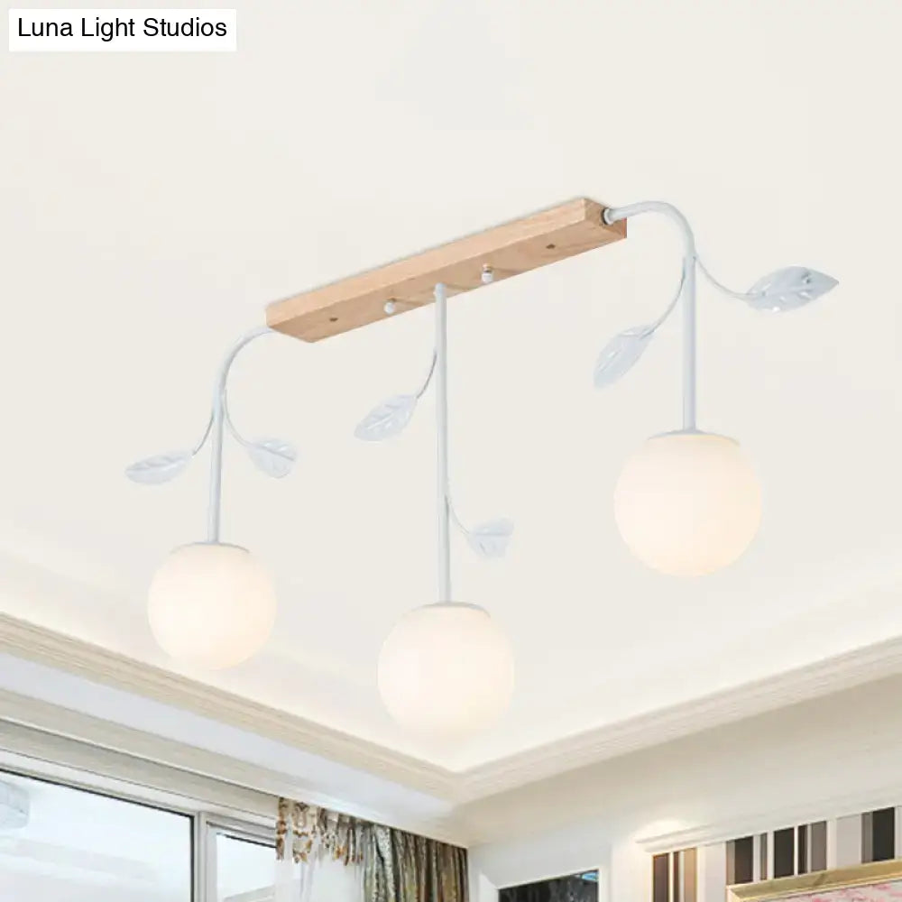 Modern white glass orb island light with wood canopy kitchen pendant