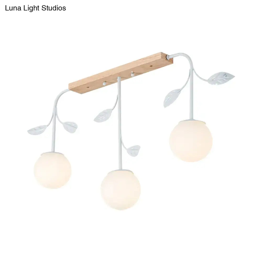 Modern white glass orb island light with wood canopy kitchen pendant