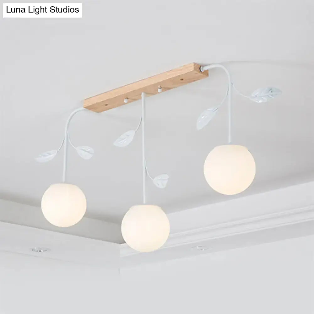 Modern white glass orb island light with wood canopy kitchen pendant
