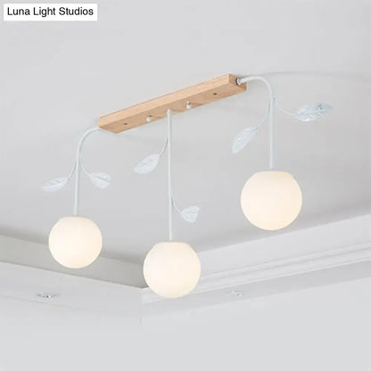 Modern white glass orb island light with wood canopy kitchen pendant