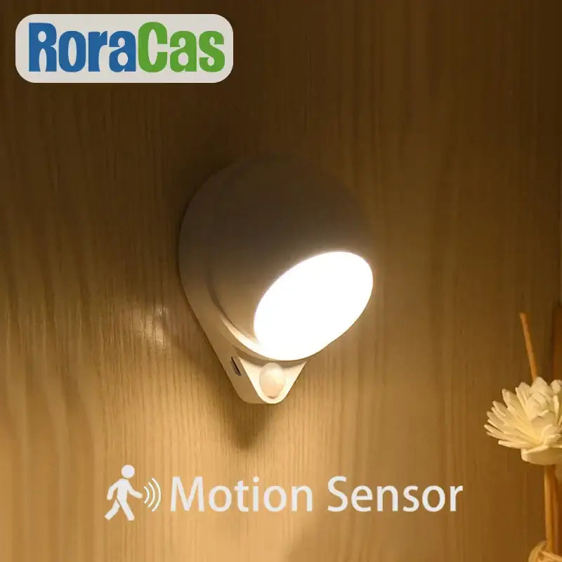 Modern white motion sensor rotating magnet night light for bedroom