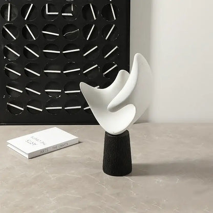 Modern white resin sculpture living room decor on wood pedestal