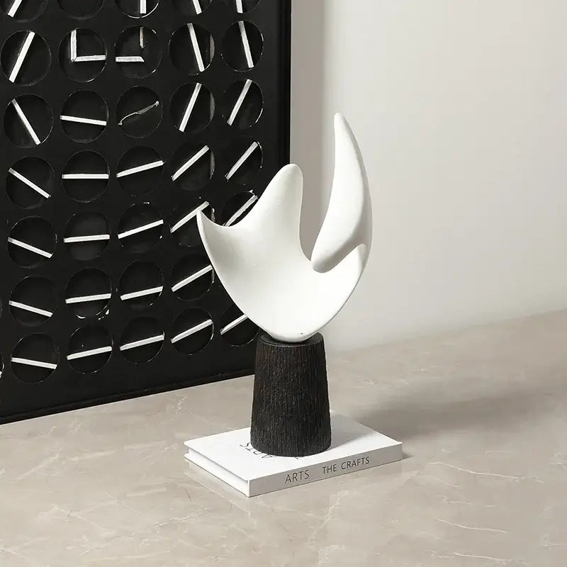 Modern white resin sculpture living room decor on wood pedestal