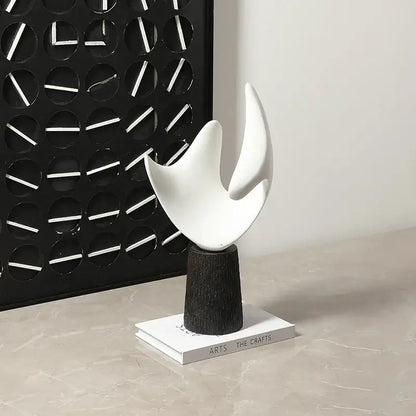 Modern white resin sculpture living room decor on wood pedestal