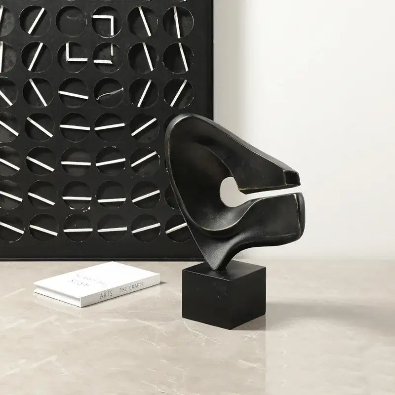 Modern white resin sculpture living room decor on wood pedestal