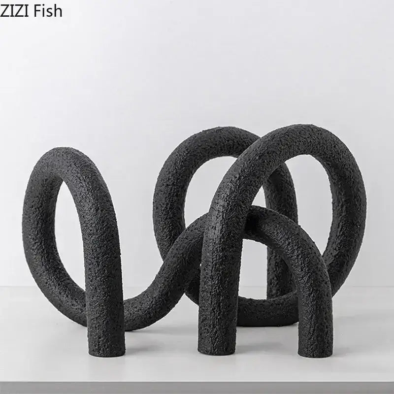 Modern white speckled abstract twisted knot sculpture living room decor
