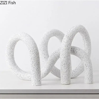 Modern white speckled abstract twisted knot sculpture living room decor