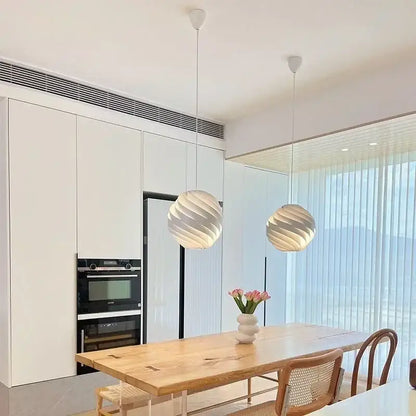 Modern white swirling spherical pendant light for dining room