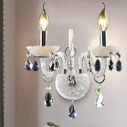 Modern white wall sconce light with teardrop crystal decoration living room