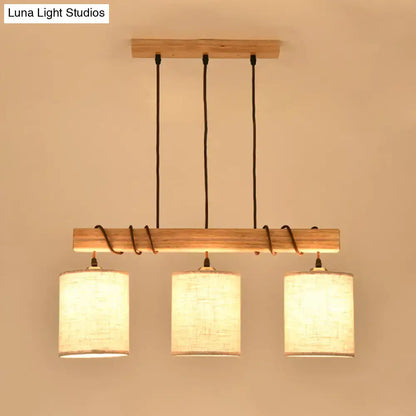Modern wood and beige fabric island lighting fixture dining room
