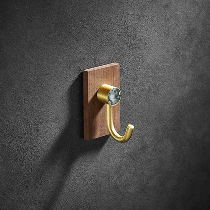 Modern wood and brushed gold wall hook row for kitchen