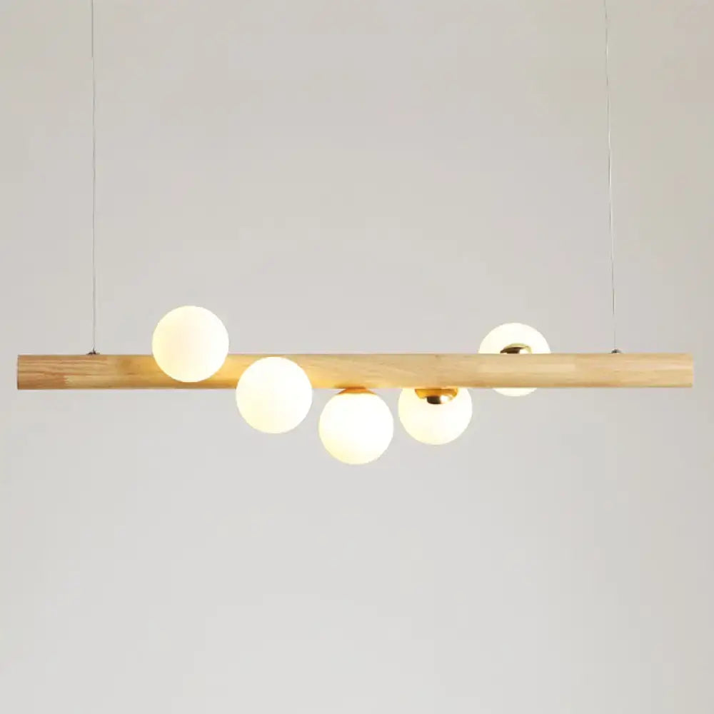 Modern wood and frosted glass suspension light for dining room