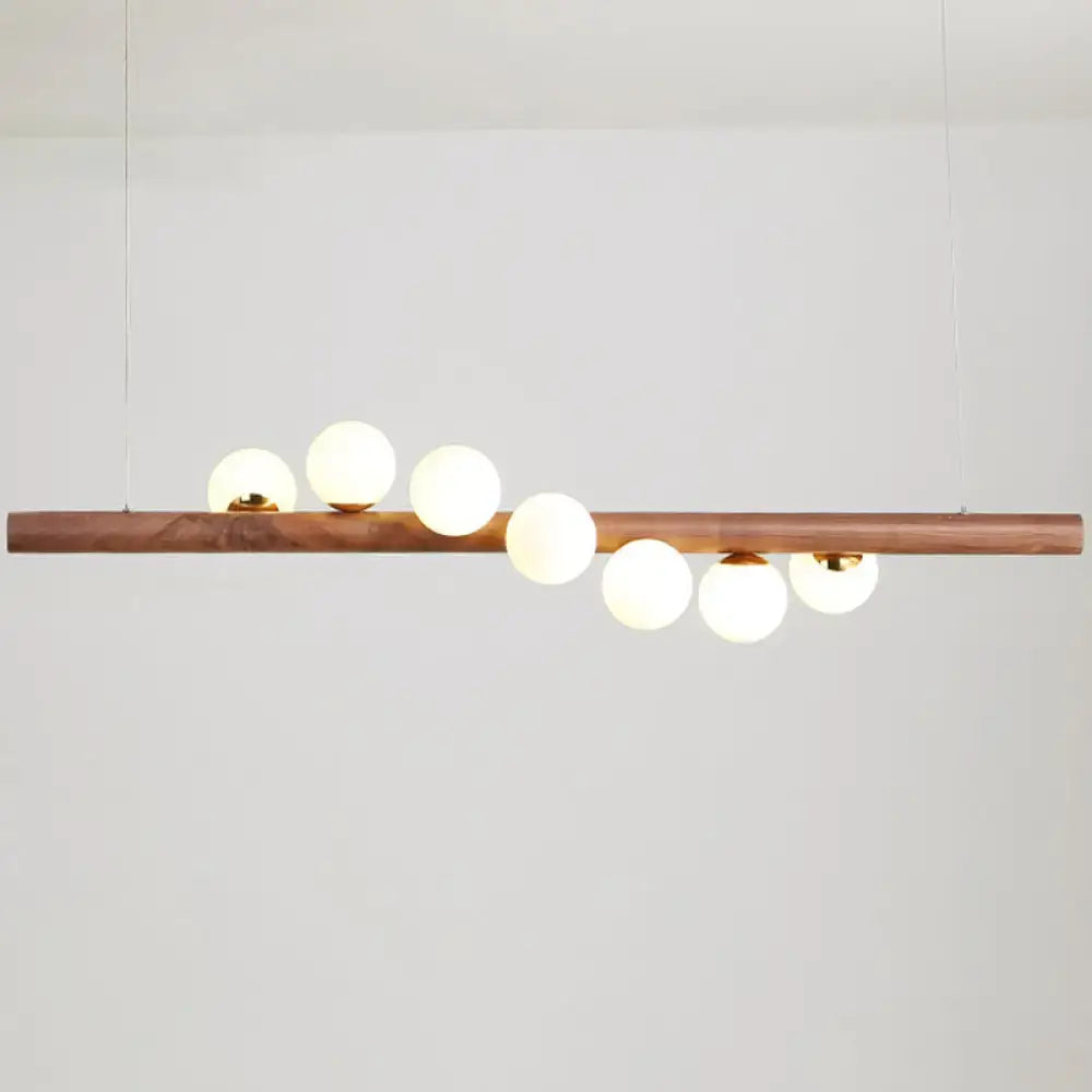 Modern wood and frosted glass suspension light for dining room