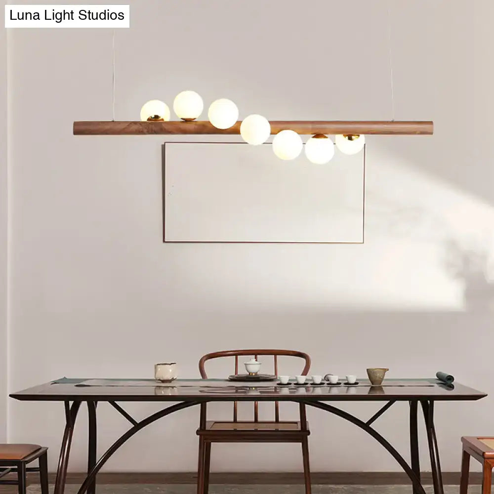 Modern wood and frosted glass suspension light for dining room