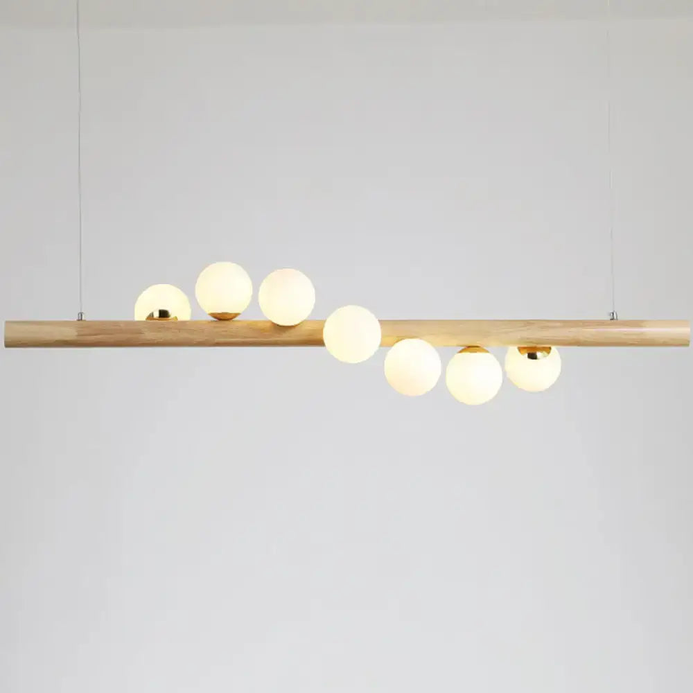 Modern wood and frosted glass suspension light for dining room
