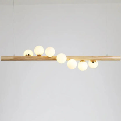 Modern wood and frosted glass suspension light for dining room