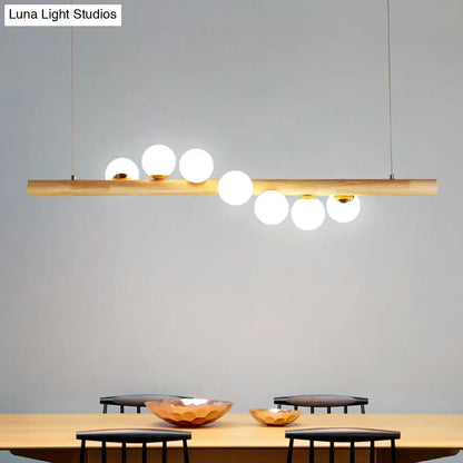 Modern wood and frosted glass suspension light for dining room