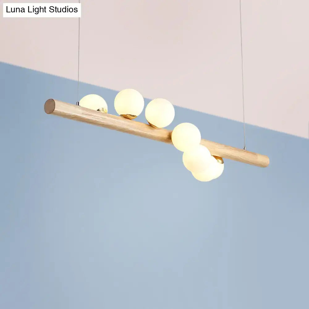 Modern wood and frosted glass suspension light for dining room
