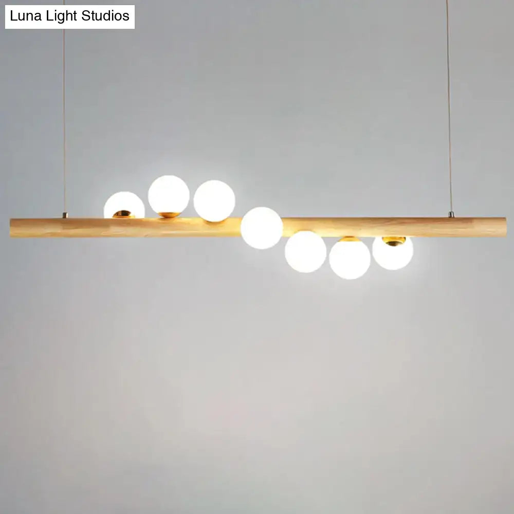 Modern wood and frosted glass suspension light for dining room