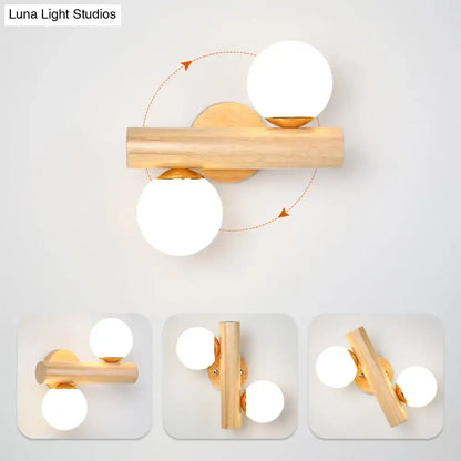 Modern wood and white glass ball rotating wall sconce bedroom light