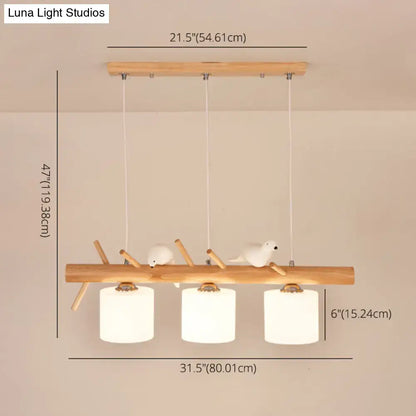 Modern wood cylinder hanging light with birds white glass kitchen
