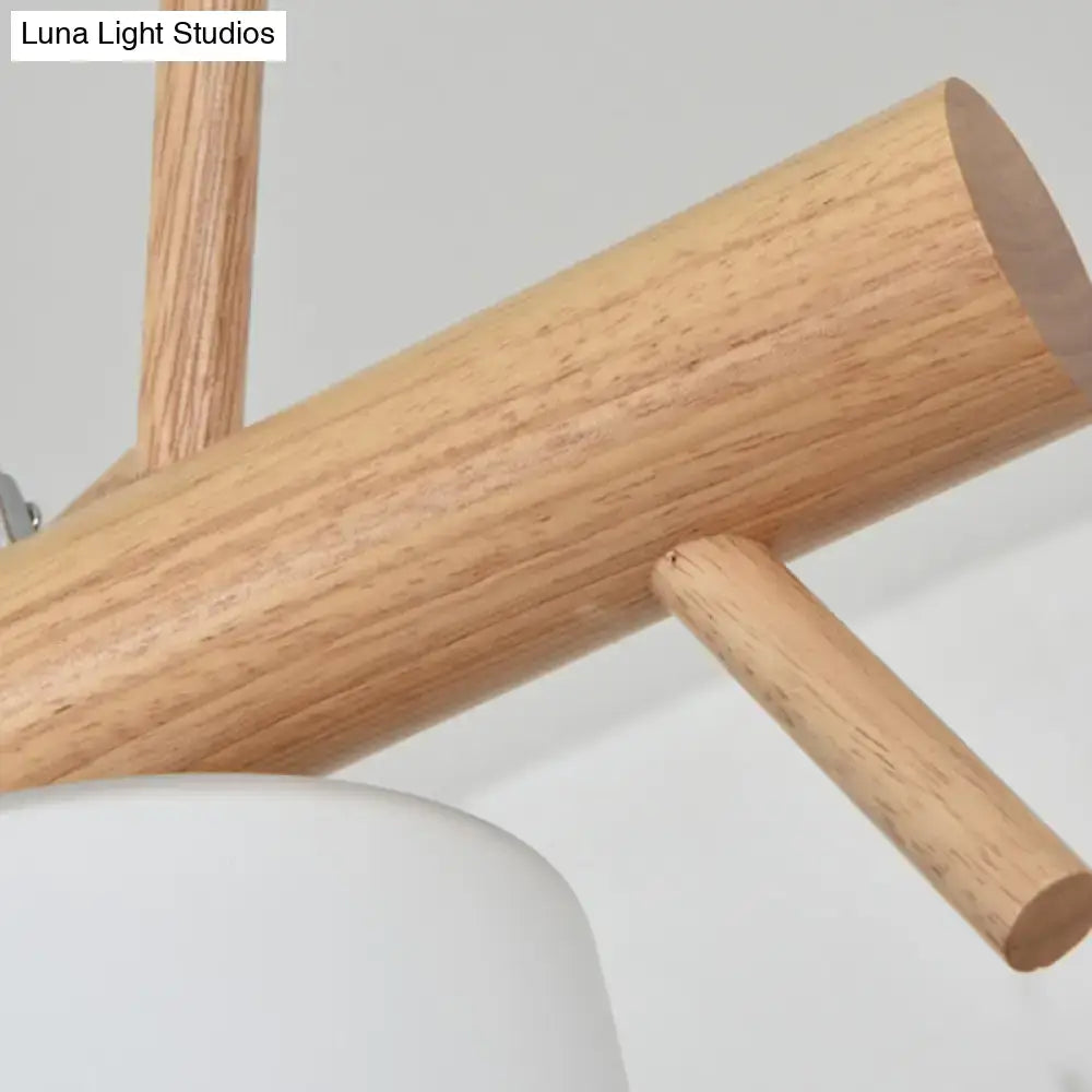 Modern wood cylinder hanging light with birds white glass kitchen