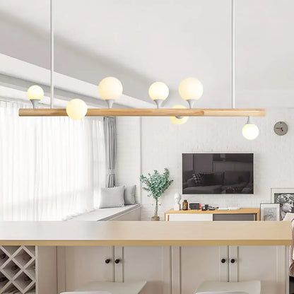 Modern wood island lamp with five globe lights dining room