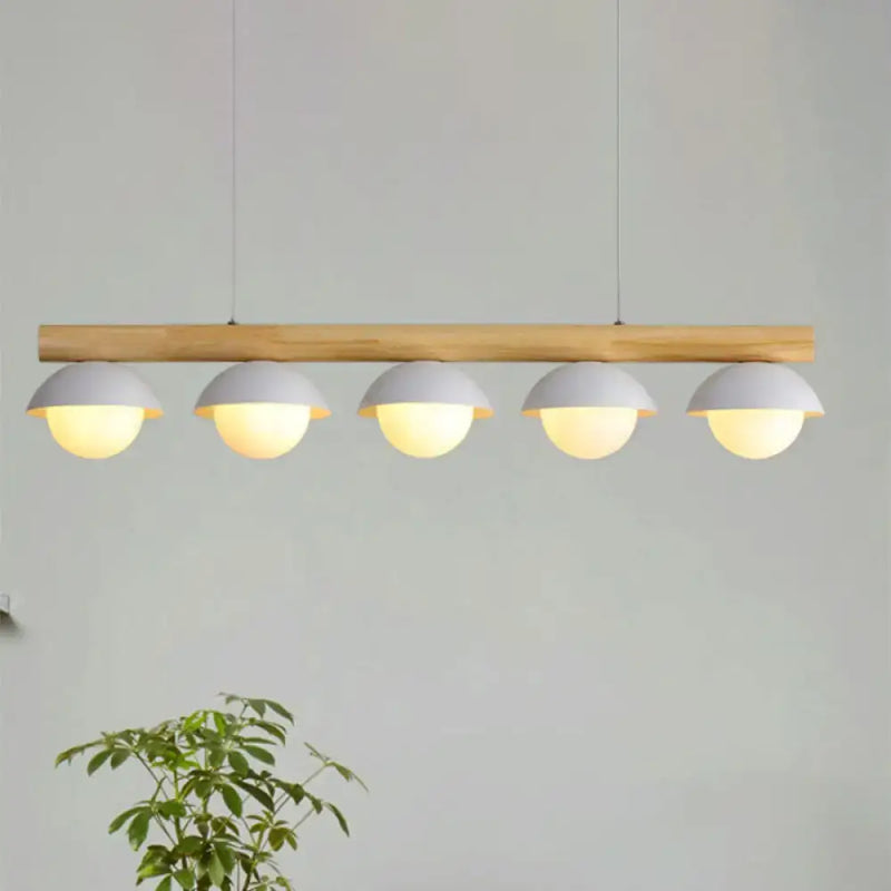 Modern wood stem linear chandelier with white shade dining room light