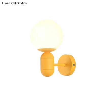 Modern yellow metal fixture wall lamp – kitchen frosted orb shade