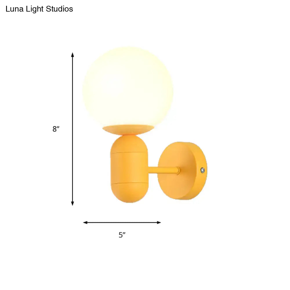 Modern yellow metal fixture wall lamp – kitchen frosted orb shade