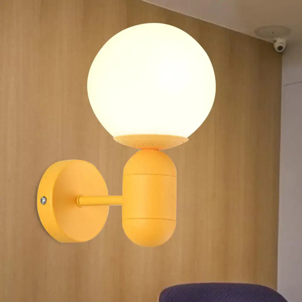 Modern yellow metal fixture wall lamp – kitchen frosted orb shade