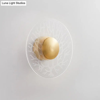 Modernist brass and clear glass wall light fixture living room