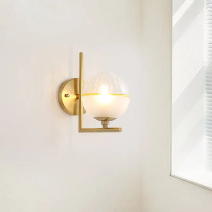 Modernist brass and frosted glass light fixture bedroom wall sconce