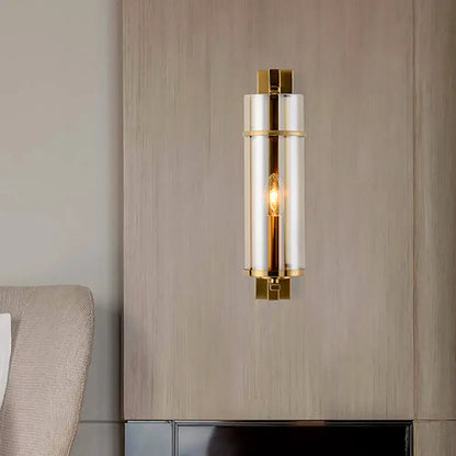 Modernist brass and water blue glass bedroom sconce light fixture