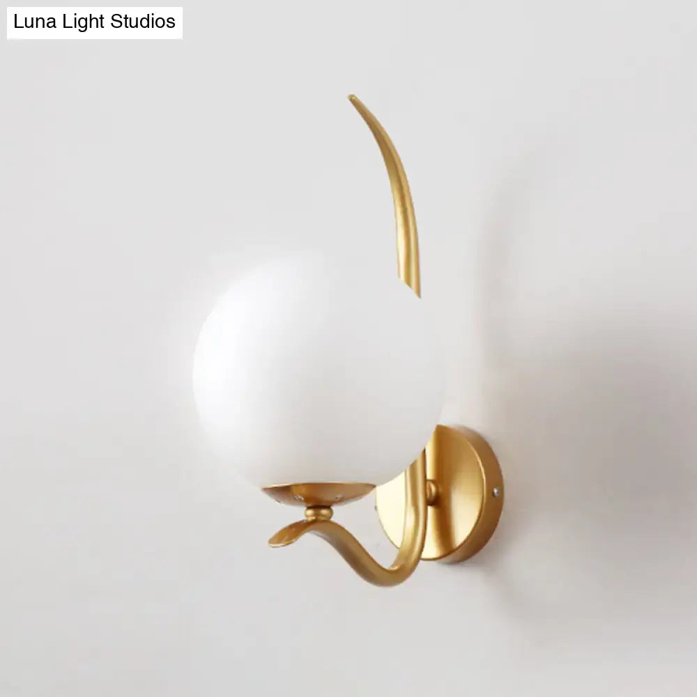 Modernist gold and white glass sconce light for bedroom